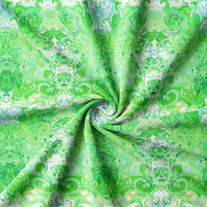 Psychedelic Pop Eco velvet by Liberty James Studio in green, draped, showing a psychedelic mirrored design