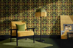Gilded Wine wallpaper by Liberty James Studio in gold, green and red, an ornate mirrored design in a living room