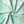 Bel Air Blossom Eco velvet by Liberty James Studio in mint green, in soft folds showing a mirrored blossom design