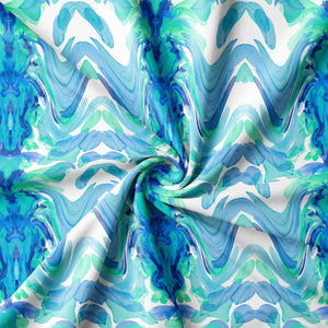 Bel Air Blossom Eco velvet by Liberty James Studio in blue, draped, showing a mirrored blossom design