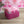 Amalfi Eco Velvet velvet by Liberty James Studio in pink, a marbled kaleidoscope design on an upholstered ottoman