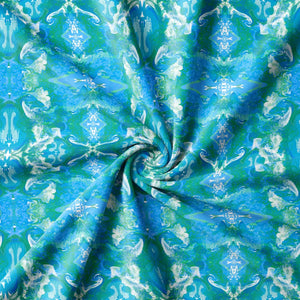 Naples velvet by Liberty James Studio in blue, in soft folds showing an ornate kaleidoscope design