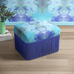 Amalfi Eco Velvet velvet by Liberty James Studio in blue and pink upholstered on a fringed footstool