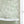 Seaview wallpaper by XV Interiors in green, fish among seaweed on a bathroom wall