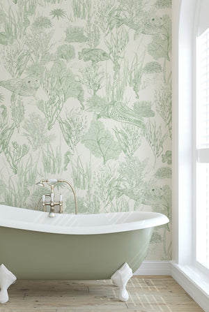 Seaview wallpaper by XV Interiors in green, fish among seaweed on a bathroom wall