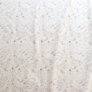 Natural Organic Hens linen by Seed Home Designs in beige, in soft folds showing line-drawn hens (alternate view)