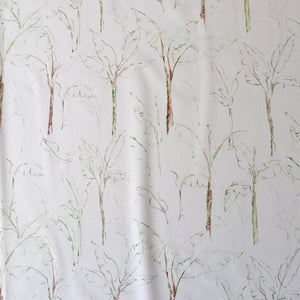 Tropical Paradise linen by Seed Home Designs in white, draped, showing slender tropical stems (alternate view)