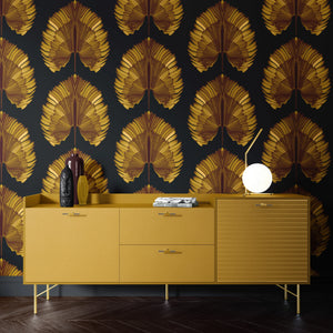 Empress Fan wallpaper by Liberty James Studio in gold, art deco fan leaves above a sideboard