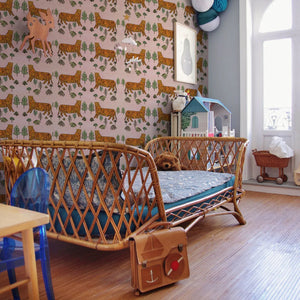 Tiger Tiger wallpaper by Annika Reed in orange and green, tigers and trees in a living room