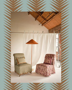 Ziggy linen by Parker and Jules in aqua and terracotta, a chevron zigzag weave upholstered on an armchair
