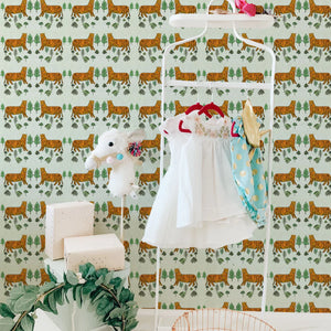 Tiger Tiger wallpaper by Annika Reed in orange and green, tigers and trees in a child's room