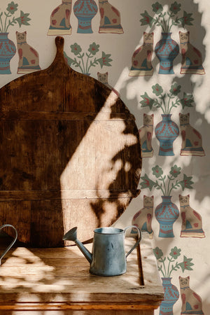 Pair of Cats wallpaper by Annika Reed in brown, pairs of cats and vases in a living room