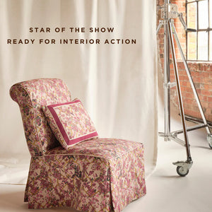 Creeping Trellis linen by Parker and Jules in cream and yellow, flowers on a trellis upholstered on an armchair