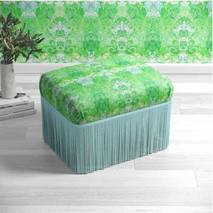 Psychedelic Pop Eco velvet by Liberty James Studio in green upholstered on a fringed footstool