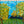 Silva grasscloth by Dami and Em Design in blue and green, full repeat of painted trees