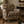 Hues of Sunflowers linen by Dami and Em Design in yellow and brown, sunflowers upholstered on an armchair