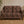Riviera Dream linen by Dami and Em Design in brown, a woven medallion design behind a sofa in a living room