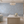 Peacock Garden in Bloom wallpaper by Dami and Em Design in blue, peacocks in a garden in a styled room setting