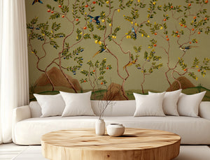 Citrus Trees wallpaper by Dami and Em Design in brown, citrus trees behind a sofa in a living room
