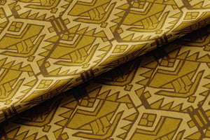 Persian Zest velvet by Dami and Em Design in gold, draped, showing a Persian motif