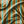 Vintage Vibe Stripe velvet by Dami and Em Design in green and orange, draped, showing vintage stripes