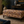 Mystical Forest Midnight Meadows linen by Dami and Em Design in black and orange, a forest of flowers in a living room