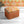 Psychedelic Pop Eco velvet by Liberty James Studio in orange, a psychedelic mirrored design on an upholstered ottoman