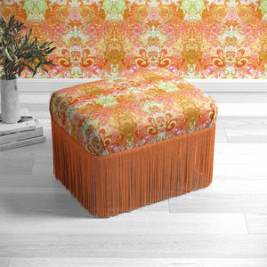 Psychedelic Pop Eco velvet by Liberty James Studio in orange, a psychedelic mirrored design on an upholstered ottoman