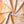 Bel Air Blossom Eco velvet by Liberty James Studio in apricot, draped, showing a mirrored blossom design