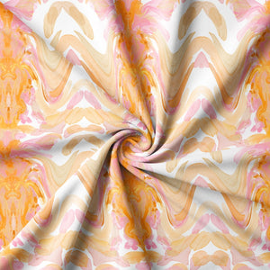 Bel Air Blossom Eco velvet by Liberty James Studio in apricot, draped, showing a mirrored blossom design