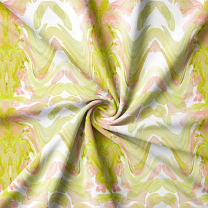 Bel Air Blossom Eco velvet by Liberty James Studio in yellow-green, draped close-up of a mirrored blossom design