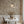 Tudor Blooms wallpaper by Studio Le Cocq in beige, Tudor-style flower urns in a dining area