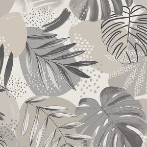 Abstract Jungle wallpaper by Brand McKenzie in grey, oversized monstera and palm leaves in a bathroom