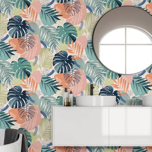 Abstract Jungle wallpaper by Brand McKenzie in teal, oversized monstera and palm leaves in a bathroom setting
