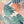Abstract Jungle wallpaper by Brand McKenzie in coral and teal, pattern detail of oversized monstera and palm leaves