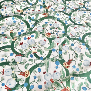 Albane linen by Claire de Quénetain in green and blue, full repeat of a hand-painted floral design