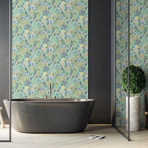 Alpine Landscape wallpaper by Brand McKenzie in sage green and lilac, dense alpine foliage in a bathroom