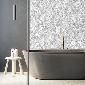 Alpine Landscape wallpaper by Brand McKenzie in grey, dense alpine foliage in a bathroom setting