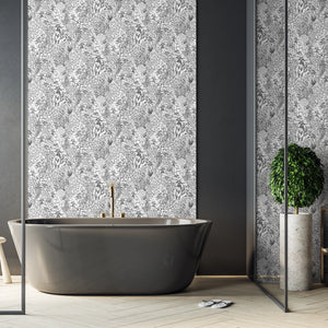 Alpine Landscape wallpaper by Brand McKenzie in grey, dense alpine foliage on a bathroom wall