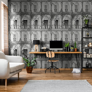 Animal Architecture wallpaper by Brand McKenzie in grey, animals peering from classical stone arches in a home office