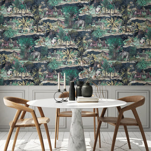 Animal Islands wallpaper by Brand McKenzie in navy, palm-filled islands and wildlife behind a dining table