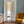 Harlequin Parade wallpaper by Annika Reed in blue, a small harlequin check in a hallway