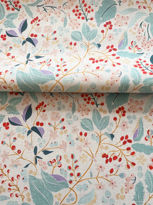 Aurore linen by Claire de Quénetain in pink and green, draped, showing a hand-painted floral design