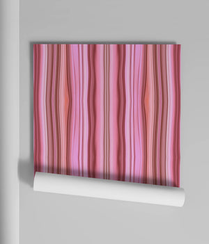 Bel Harbour wallpaper by Liberty James Studio in coral, partly unrolled roll showing varied stripes