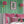 Bel Harbour wallpaper by Liberty James Studio in green, varied stripes in a bedroom