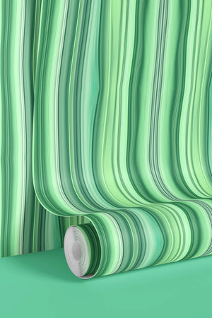 Bel Harbour wallpaper by Liberty James Studio in green, partly unrolled roll showing varied stripes