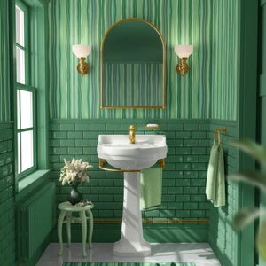 Bel Harbour wallpaper by Liberty James Studio in green, varied stripes in a bathroom