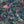 Balancing Act wallpaper by Brand McKenzie in navy, pattern detail of monkeys, toucans and flamingos in vines