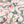 Balancing Act wallpaper by Brand McKenzie in pink, close view of monkeys, toucans and flamingos in vines