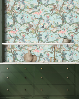 Balancing Act wallpaper by Brand McKenzie in mint green and pink above a sideboard (alternate view)
